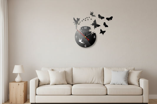 Wall clock with fairy and butterfly designs on a white background